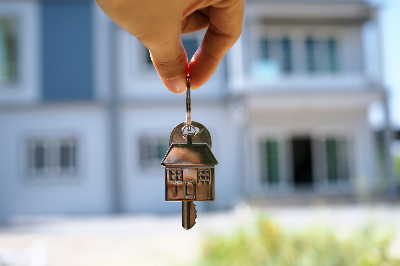 Hand Dangling House Keys of New Home